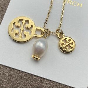 Tory Burch Gold Necklace with Pearl and Logo Charms